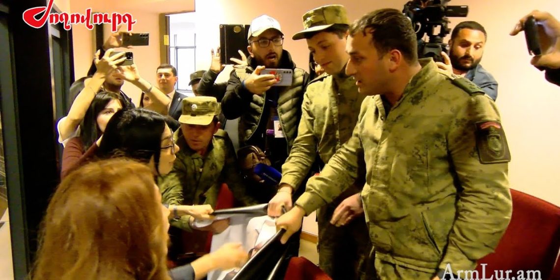 Armenia -- Security service stops journalists' action in Parliament, Yerevan, 26Mar2025